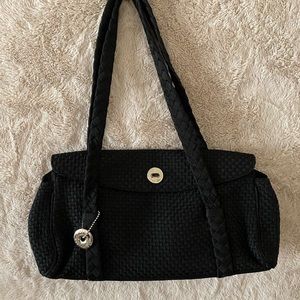 Sak black handbag with braid strap.